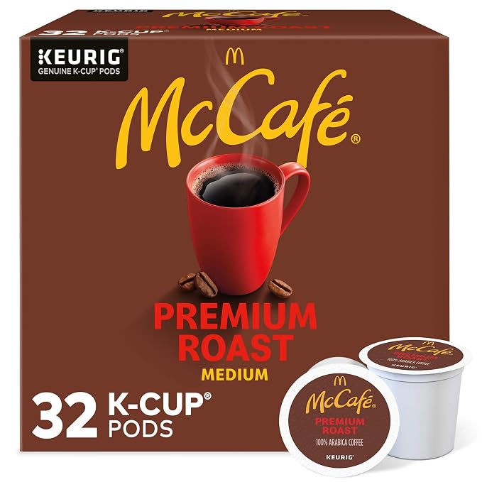 McCafe Premium Roast medium roast coffee, brown 32-count K-Cup box with red mug artwork and two pods