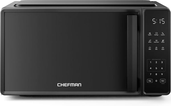 Black Chefman countertop microwave with vertical door handle, digital display and right-side numeric keypad.⠋