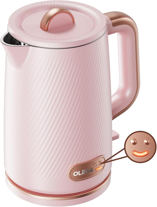 Pink electric kettle with rose gold accents on a white background