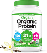 A bottle of Orgain Organic Protein Vanilla Bean flavor plant-based protein powder, shown on a clean white background with vanilla flower and bean pods as flavor props.