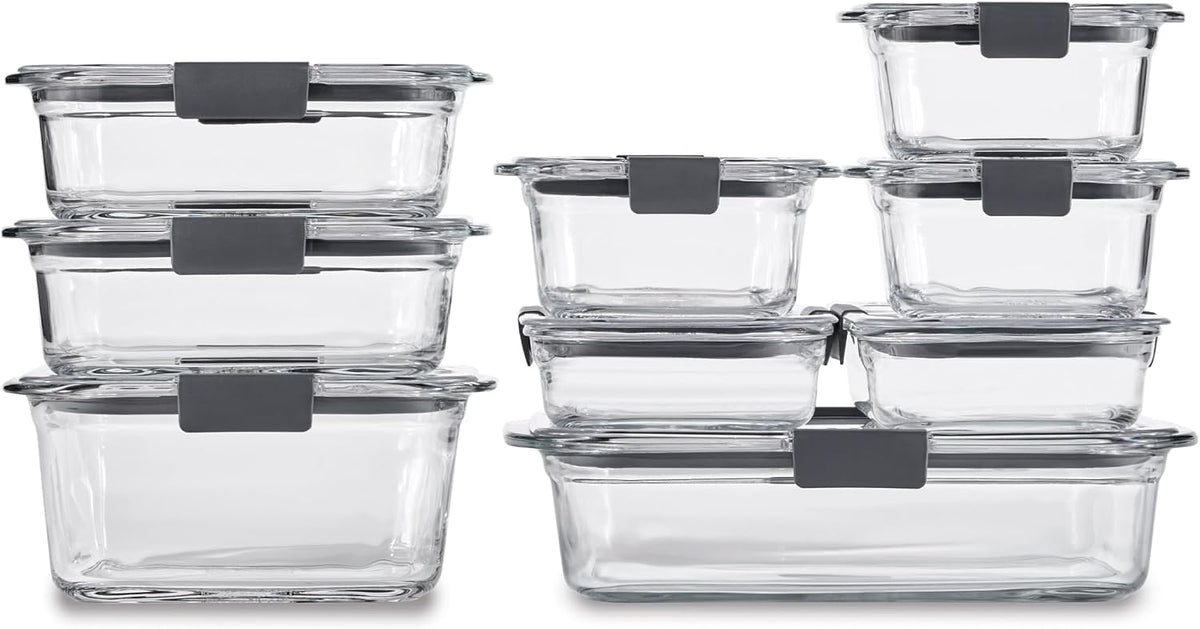 A set of clear glass food storage containers with dark gray silicone seals, shown in multiple sizes stacked together on a white background.