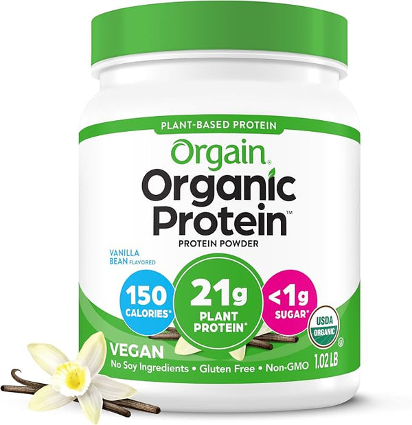 Orgain Organic Protein powder container with vanilla bean and flower on a white background