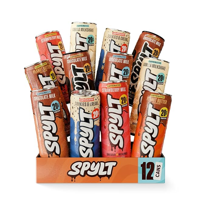 Assorted SPYLT energy drink cans in a display box on a white background