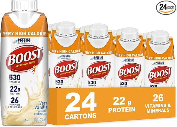 A 24-pack display of Nestle Boost Very High Calorie vanilla powdered drink mix cartons, with one large bottle in front and a bright orange cardboard base labeled '24 cartons 22 g protein 26 vitamins & minerals'.